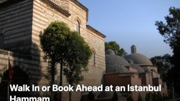 Exterior of a historic domed Turkish bath building in Istanbul