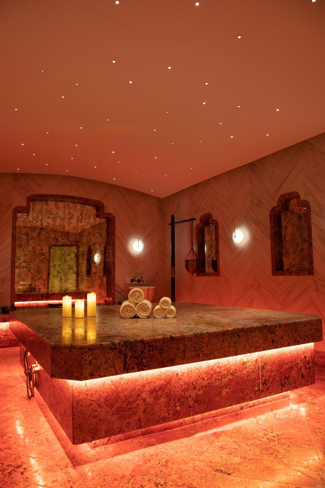 Exquisite Turkish bath in Delhi with warm lighting, towels, and candles